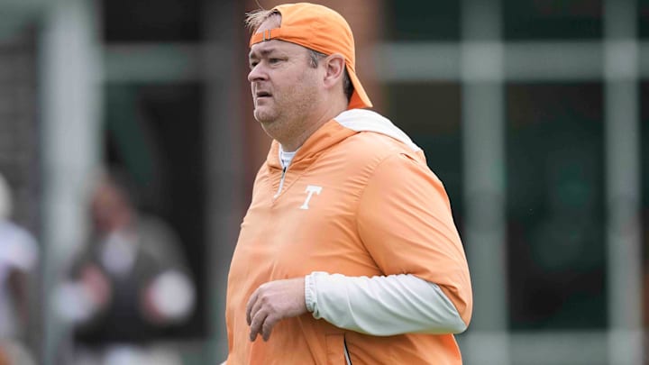 Tennessee head coach Josh Heupel jogs across the field during Tennessee football preseason practice, in Knoxville, Tennessee, July 31, 2025.