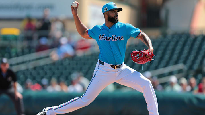 Feb 28, 2025; Jupiter, Florida, USA; Miami Marlins starting pitcher Sandy Alcantara (22) delivers a pitch against the Atlanta Braves during the first inning at Roger Dean Chevrolet Stadium. 
