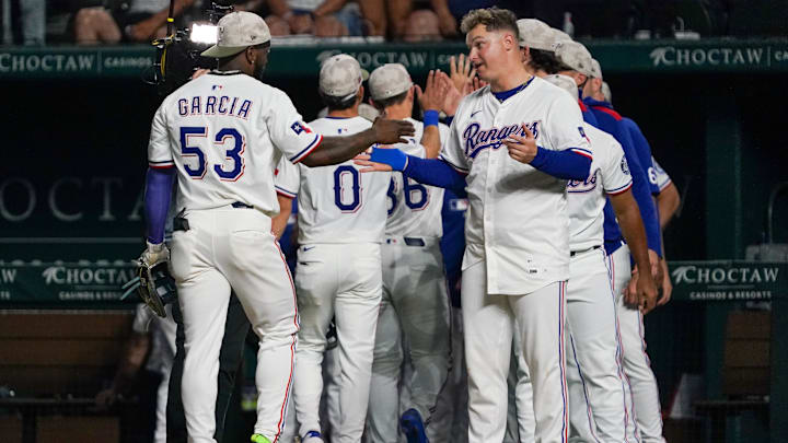 May 17, 2025; Arlington, Texas, USA; Texas Rangers outfielder Adolis García (53) celebrates with first baseman Joc Pederson (4) following a game against the Houston Astros at Globe Life Field. Mandatory Credit: Raymond Carlin III-Imagn Images