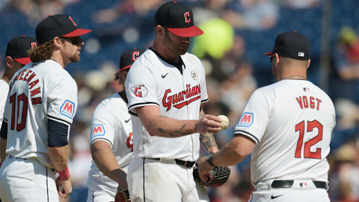 Sep 15, 2024; Cleveland, Ohio, USA; Cleveland Guardians manager Stephen Vogt (12) relieves starting pitcher Ben Lively (39) during the sixth inning against the Tampa Bay Rays at Progressive Field. Mandatory Credit: Ken Blaze-Imagn Images