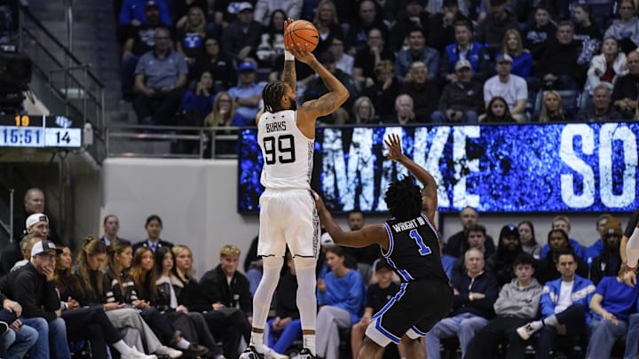 Feb 24, 2026; Provo, Utah, USA; UCF Knights forward Jordan Burks (99) takes a three point shot during the first half against the BYU Cougars at Marriott Center. Mandatory Credit: Aaron Baker-Imagn Images Feb 24, 2026; Provo, Utah, USA; UCF Knights forward Jordan Burks (99) takes a three point shot during the first half against the BYU Cougars at Marriott Center. Mandatory Credit: Aaron Baker-Imagn Images
