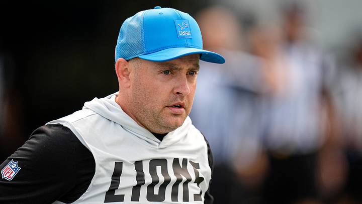 Detroit Lions offensive coordinator Drew Petzing walks onto the field for practice during training camp at Meijer Performance Center in Allen Park on Monday, August 10, 2026.