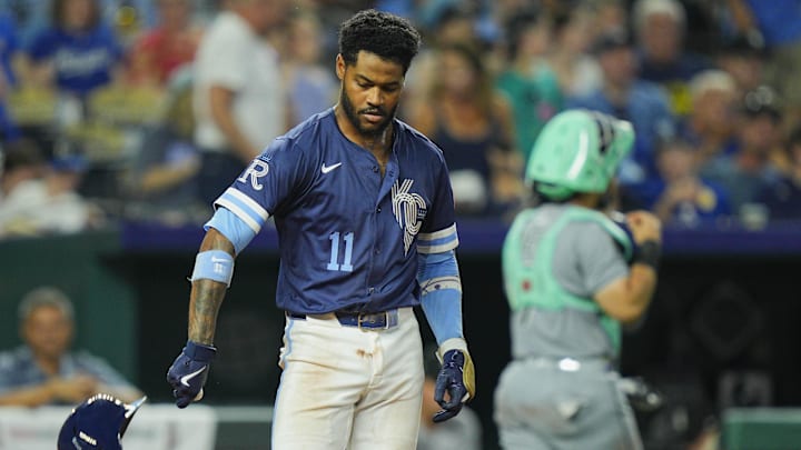 Aug 15, 2025; Kansas City, Missouri, USA; Kansas City Royals third baseman Maikel Garcia (11) throws his helmet after striking out to end the eighth inning against the Chicago White Sox at Kauffman Stadium. Mandatory Credit: Jay Biggerstaff-Imagn Images