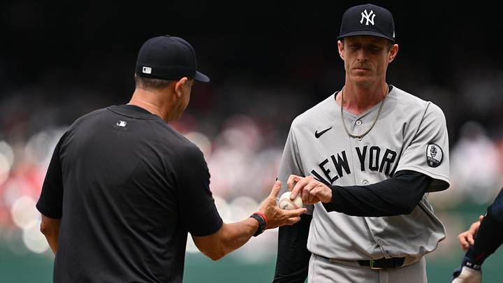 Jul 12, 2026; Washington, District of Columbia, USA; New York Yankees pitcher Tim Hill (41) is pulled by manager Aaron Boone (17) in the sixth inning against the Washington Nationals at Nationals Park. Mandatory Credit: Jamie Sabau-Imagn Images Jul 12, 2026; Washington, District of Columbia, USA; New York Yankees pitcher Tim Hill (41) is pulled by manager Aaron Boone (17) in the sixth inning against the Washington Nationals at Nationals Park. Mandatory Credit: Jamie Sabau-Imagn Images