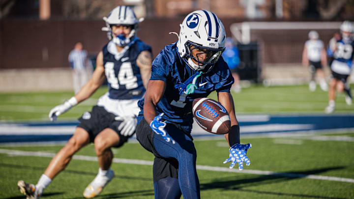 BYU cornerback Tre Alexander grabs an interception on the first day of Spring camp 2025