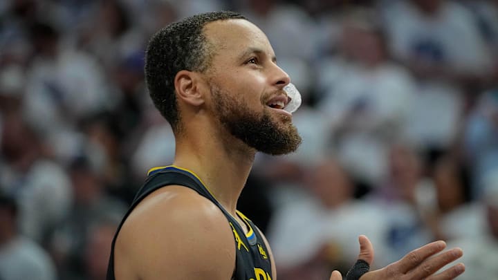 May 6, 2025; Minneapolis, Minnesota, USA; Golden State Warriors guard Stephen Curry (30) prepares to play the Minnesota Timberwolves before game one of the second round for the 2025 NBA Playoffs at Target Center. Mandatory Credit: Bruce Kluckhohn-Imagn Images