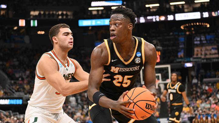 Mar 20, 2026; St. Louis, MO, USA; Missouri Tigers forward Mark Mitchell (25) drives to the basket \against the Miami (FL) Hurricanes during the second half during a first round game of the men's 2026 NCAA Tournament at Enterprise Center. Mandatory Credit: Jeff Curry-Imagn Images Mar 20, 2026; St. Louis, MO, USA; Missouri Tigers forward Mark Mitchell (25) drives to the basket \against the Miami (FL) Hurricanes during the second half during a first round game of the men's 2026 NCAA Tournament at Enterprise Center. Mandatory Credit: Jeff Curry-Imagn Images
