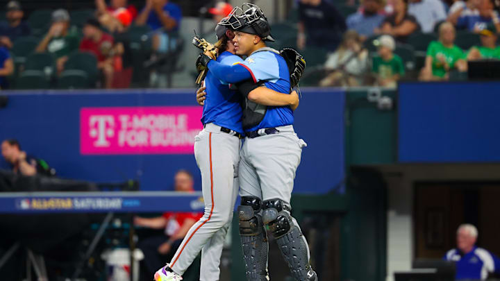 Jul 13, 2024; Arlington, TX, USA; National League Future pitcher Bubba Chandler (l) hugs National League Future catcher Thayron Liranzo (r) after the game against the American League Future team during the Major league All-Star Futures game at Globe Life Field. Jul 13, 2024; Arlington, TX, USA; National League Future pitcher Bubba Chandler (l) hugs National League Future catcher Thayron Liranzo (r) after the game against the American League Future team during the Major league All-Star Futures game at Globe Life Field.