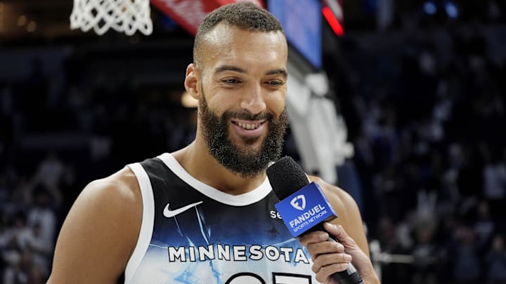 Apr 11, 2025; Minneapolis, Minnesota, USA; Minnesota Timberwolves center Rudy Gobert (27) smiles during an interview after the game against the Brooklyn Nets at Target Center. Mandatory Credit: Bruce Kluckhohn-Imagn Images
