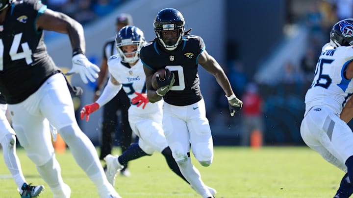 Jacksonville Jaguars wide receiver Calvin Ridley (0) rushes for yards during the second quarter an