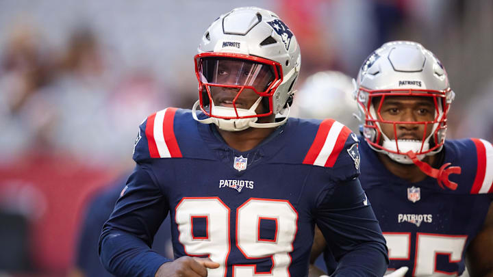 Dec 15, 2024; Glendale, Arizona, USA; New England Patriots defensive end Keion White (99) against the Arizona Cardinals at State Farm Stadium. Mandatory Credit: Mark J. Rebilas-Imagn Images Dec 15, 2024; Glendale, Arizona, USA; New England Patriots defensive end Keion White (99) against the Arizona Cardinals at State Farm Stadium. Mandatory Credit: Mark J. Rebilas-Imagn Images