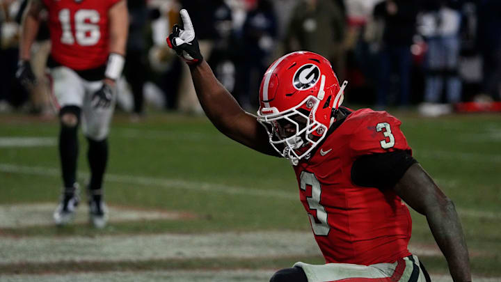 Georgia running back Nate Frazier (3) celebrates after driving in for the game winning score during overtime of a NCAA college football game against Georgia Tech in Athens, Ga., on Friday, Nov. 29, 2024.