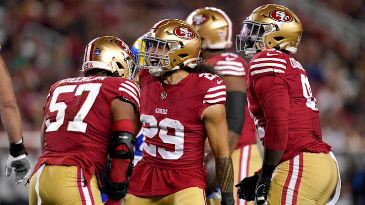 Dec 12, 2024; Santa Clara, California, USA; San Francisco 49ers linebacker Dre Greenlaw (57) is congratulated by safety Talanoa Hufanga (29) after making a tackle against the Los Angeles Rams in the first quarter at Levi's Stadium. Dec 12, 2024; Santa Clara, California, USA; San Francisco 49ers linebacker Dre Greenlaw (57) is congratulated by safety Talanoa Hufanga (29) after making a tackle against the Los Angeles Rams in the first quarter at Levi's Stadium.