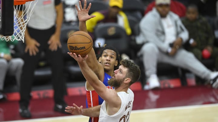 Oct 14, 2025; Cleveland, Ohio, USA; Cleveland Cavaliers forward Dean Wade (32) shoots beside Detroit Pistons forward Bobi Klintman (34) in the fourth quarter at Rocket Arena. Mandatory Credit: David Richard-Imagn Images Oct 14, 2025; Cleveland, Ohio, USA; Cleveland Cavaliers forward Dean Wade (32) shoots beside Detroit Pistons forward Bobi Klintman (34) in the fourth quarter at Rocket Arena. Mandatory Credit: David Richard-Imagn Images