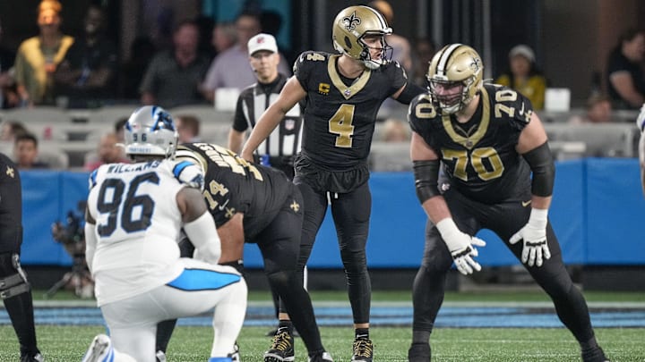 New Orleans Saints quarterback Derek Carr (4) calls signals  against the Carolina Panthers