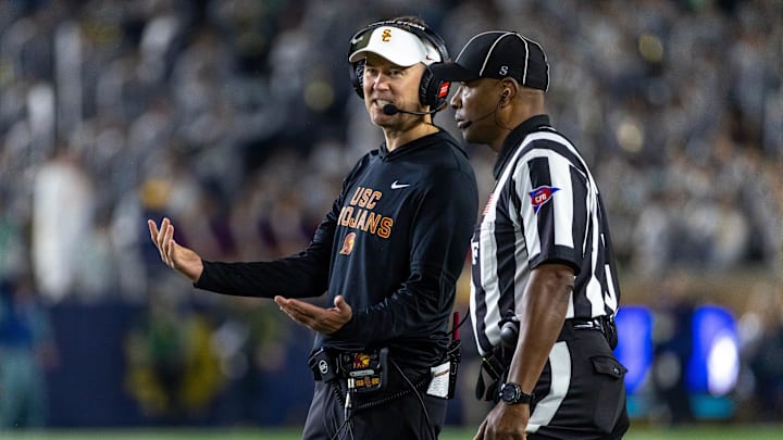 Oct 18, 2025; South Bend, Indiana, USA; Southern California Trojans head coach Lincoln Riley talks to an official during the first half against the Notre Dame Fighting Irish at Notre Dame Stadium. Mandatory Credit: Michael Caterina-Imagn Images Oct 18, 2025; South Bend, Indiana, USA; Southern California Trojans head coach Lincoln Riley talks to an official during the first half against the Notre Dame Fighting Irish at Notre Dame Stadium. Mandatory Credit: Michael Caterina-Imagn Images