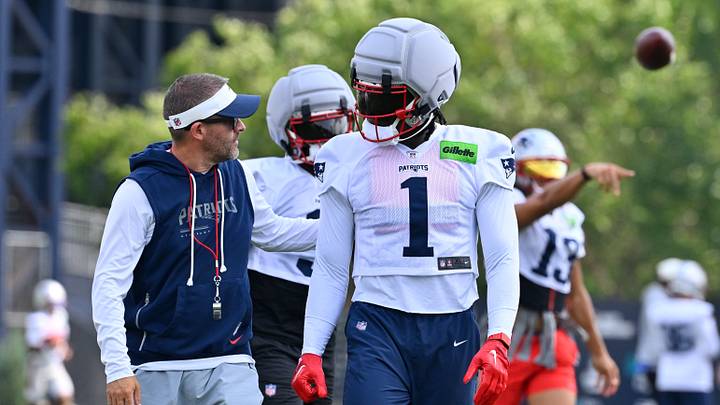 Jul 28, 2026; Foxborough, MA, USA; New England Patriots offensive coordinator Josh McDaniels speaks to wide receiver A.J. Brown (1) during training camp at Gillette Stadium. Mandatory Credit: Eric Canha-Imagn Images Jul 28, 2026; Foxborough, MA, USA; New England Patriots offensive coordinator Josh McDaniels speaks to wide receiver A.J. Brown (1) during training camp at Gillette Stadium. Mandatory Credit: Eric Canha-Imagn Images
