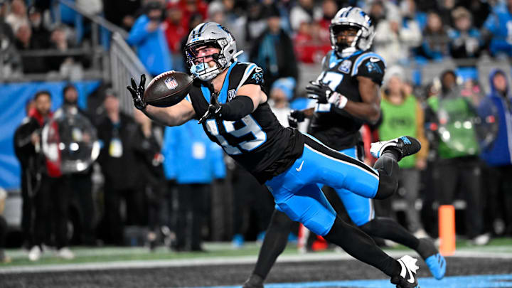 Dec 1, 2024; Charlotte, North Carolina, USA;  Carolina Panthers wide receiver Adam Thielen (19) attempts to catch the ball in the end zone in the second quarter at Bank of America Stadium. Mandatory Credit: Bob Donnan-Imagn Images