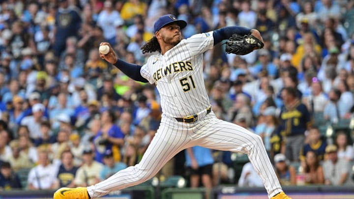 Aug 23, 2025; Milwaukee, Wisconsin, USA;  Milwaukee Brewers starting pitcher Freddy Peralta (51) throws a pitch in the first inning against the San Francisco Giants at American Family Field. Mandatory Credit: Benny Sieu-Imagn Images