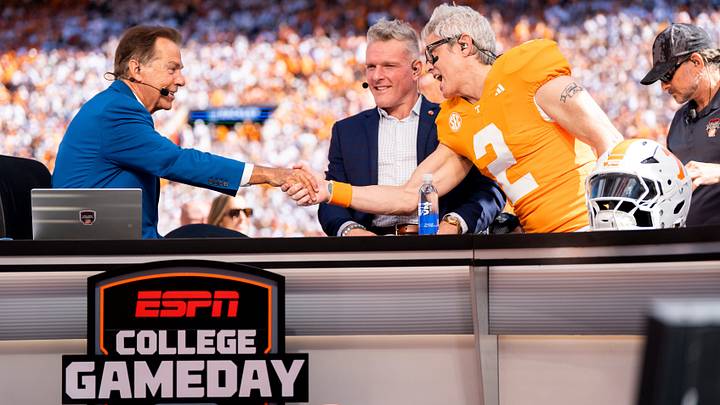 Johnny Knoxville, right, shakes hands with Nick Saban, left, during ESPN’s College GameDay before a college football game between Tennessee and Texas at Neyland Stadium in Knoxville, Tenn. on Sept. 26, 2026.