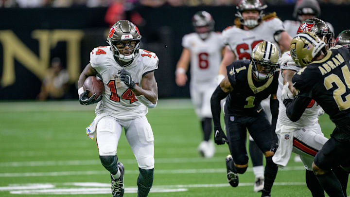 Oct 13, 2024; New Orleans, Louisiana, USA; Tampa Bay Buccaneers wide receiver Chris Godwin (14) cruises for a touchdown during the third quarter against the New Orleans Saints at Caesars Superdome.