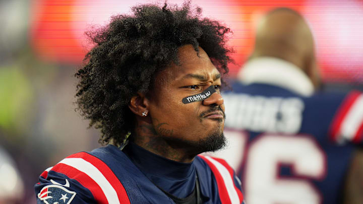 Jan 4, 2026; Foxborough, Massachusetts, USA; New England Patriots wide receiver Stefon Diggs (8) looks on before the game against the Miami Dolphins at Gillette Stadium. Mandatory Credit: David Butler II-Imagn Images