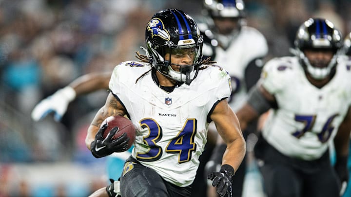 Baltimore Ravens running back Keaton Mitchell runs the ball against the Jacksonville Jaguars.