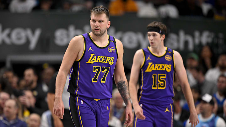 Apr 9, 2025; Dallas, Texas, USA; Los Angeles Lakers guard Luka Doncic (77) and guard Austin Reaves (15) during the game between the Dallas Mavericks and the Los Angeles Lakers at American Airlines Center. Mandatory Credit: Jerome Miron-Imagn Images Apr 9, 2025; Dallas, Texas, USA; Los Angeles Lakers guard Luka Doncic (77) and guard Austin Reaves (15) during the game between the Dallas Mavericks and the Los Angeles Lakers at American Airlines Center. Mandatory Credit: Jerome Miron-Imagn Images