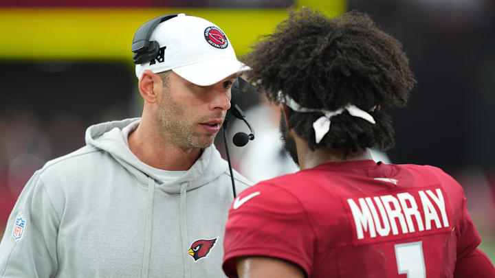 Sep 15, 2024; Glendale, Arizona, USA; Arizona Cardinals head coach Jonathan Gannon talks with Arizona Cardinals quarterback Kyler Murray (1) during the second half against the Los Angeles Rams at State Farm Stadium. Mandatory Credit: Joe Camporeale-Imagn Images