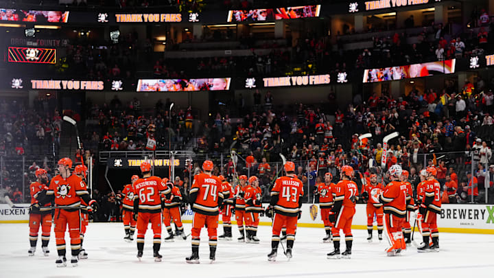 Apr 13, 2025; Anaheim, California, USA; Anaheim Ducks players acknowledge the crowd after a game against the Colorado Avalanche at the Honda Center. Mandatory Credit: Kirby Lee-Imagn Images