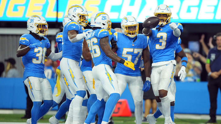 Oct 29, 2023; Inglewood, California, USA; Los Angeles Chargers safety Derwin James Jr. (3) celebrates with cornerback Asante Samuel Jr. (26) and linebacker Amen Ogbongbemiga (57) after intercepting a pass against the Chicago Bears in the second half at SoFi Stadium. Mandatory Credit: Kirby Lee-USA TODAY Sports