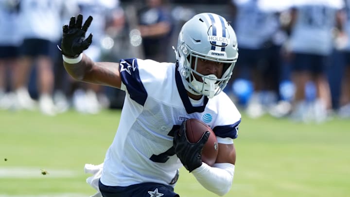Dallas Cowboys receiver Traeshon Holden carries the ball during training camp at the River Ridge Fields. 