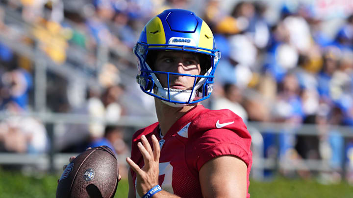 Jul 23, 2025; Los Angeles, CA, USA; Los Angeles Rams quarterback Stetson Bennett (13) throws the ball during training camp at Loyola Marymount University. Mandatory Credit: Kirby Lee-Imagn Images