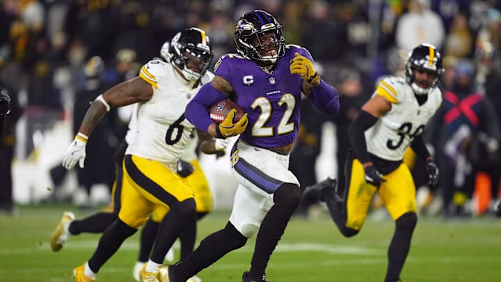 Jan 11, 2025; Baltimore, Maryland, USA; Baltimore Ravens running back Derrick Henry (22) runs to score a touchdown against the Pittsburgh Steelers in the third quarter in an AFC wild card game at M&T Bank Stadium. Mandatory Credit: Mitch Stringer-Imagn Images