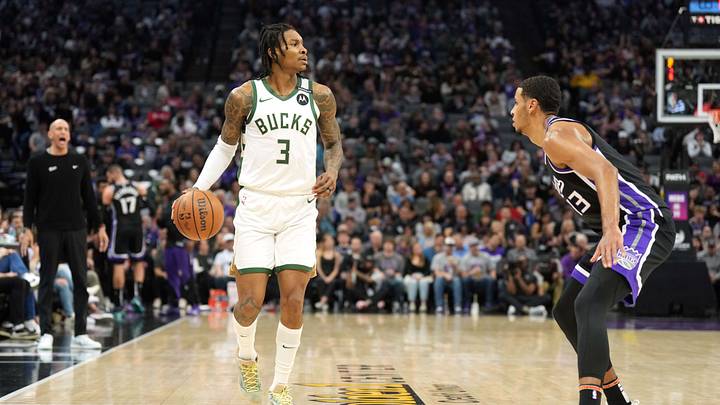 Mar 22, 2025; Sacramento, California, USA; Milwaukee Bucks guard Kevin Porter Jr. (3) dribbles against Sacramento Kings forward Keegan Murray (right) during the first quarter at Golden 1 Center. Mandatory Credit: Darren Yamashita-Imagn Images Mar 22, 2025; Sacramento, California, USA; Milwaukee Bucks guard Kevin Porter Jr. (3) dribbles against Sacramento Kings forward Keegan Murray (right) during the first quarter at Golden 1 Center. Mandatory Credit: Darren Yamashita-Imagn Images