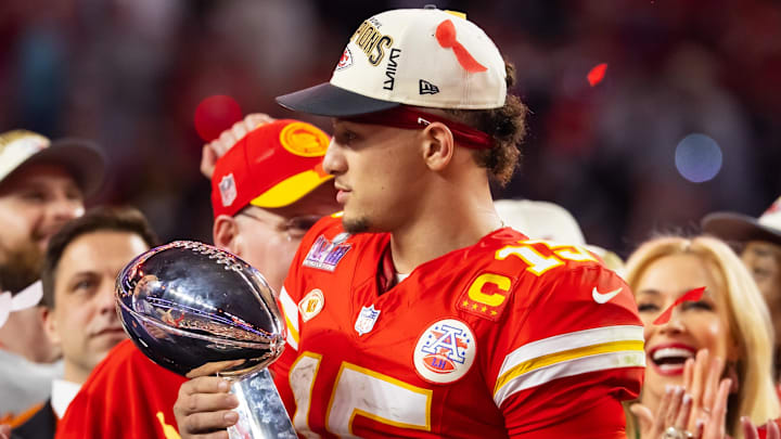 Feb 11, 2024; Paradise, Nevada, USA; Kansas City Chiefs quarterback Patrick Mahomes (15) celebrates with the Vince Lombardi Trophy after defeating the San Francisco 49ers in overtime of Super Bowl LVIII at Allegiant Stadium. Mandatory Credit: Mark J. Rebilas-Imagn Images Feb 11, 2024; Paradise, Nevada, USA; Kansas City Chiefs quarterback Patrick Mahomes (15) celebrates with the Vince Lombardi Trophy after defeating the San Francisco 49ers in overtime of Super Bowl LVIII at Allegiant Stadium. Mandatory Credit: Mark J. Rebilas-Imagn Images