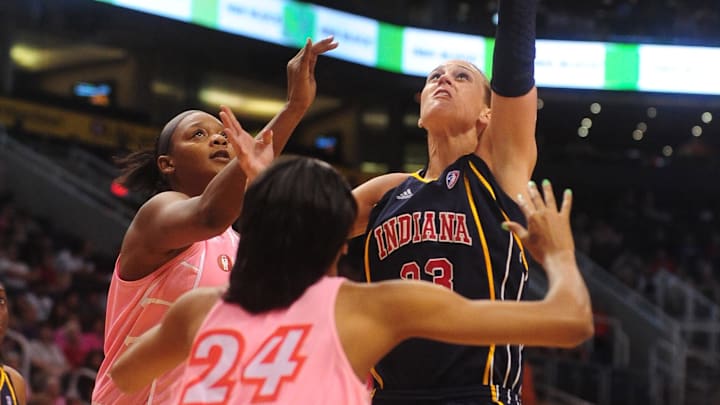 Aug 8, 2010; Phoenix, AZ, USA; Indiana Fever guard Katie Douglas puts up a shot against Phoenix Mercury Forward DeWanna Bonner during the first half at US Airways Center. Mandatory Credit: Jennifer Stewart-Imagn Images Aug 8, 2010; Phoenix, AZ, USA; Indiana Fever guard Katie Douglas puts up a shot against Phoenix Mercury Forward DeWanna Bonner during the first half at US Airways Center. Mandatory Credit: Jennifer Stewart-Imagn Images