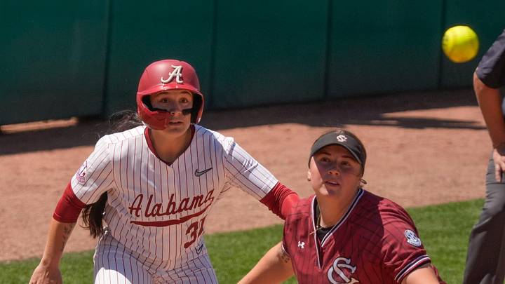May 2, 2026; Tuscaloosa, AL, USA; Alabama base runner Alex Pupillo watches Bama hit sail past the South Carolina infield at Rhoads Stadium in the game 3 of the series between South Carolina and Alabama.