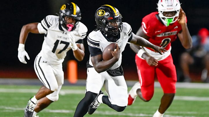 Denari Hill of St. Frances Academy runs free during the Panthers' 42-13 rout of Chaminade-Madonna, Saturday night in South Florida.