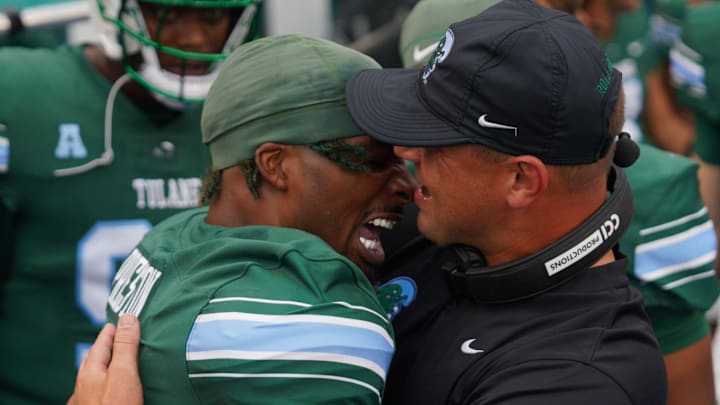 Tulane Green Wave head coach Jon Sumrall and wide receiver Shazz Preston celebrate together.