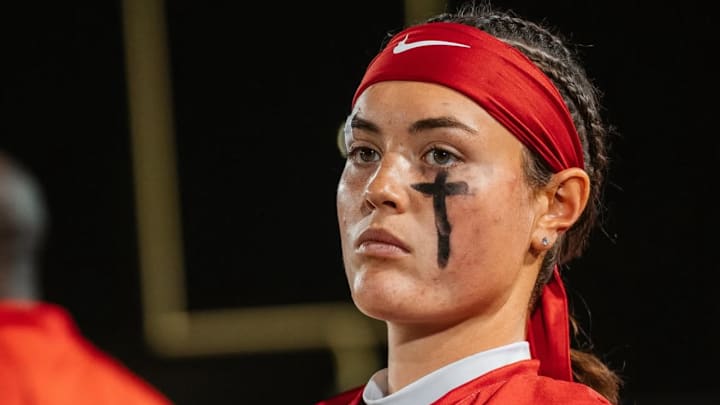 Daisy Throckmorton suits up for McClatchy High School (CA) Varsity games as school first ever Female quarterback 