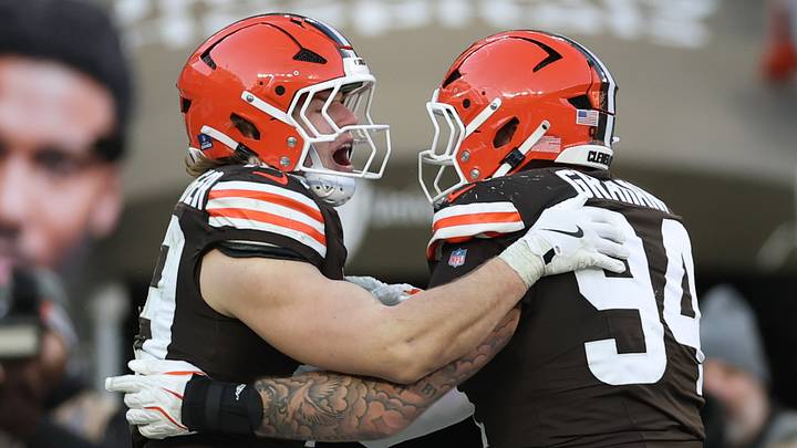 Dec 21, 2025; Cleveland, Ohio, USA;  Cleveland Browns linebacker Carson Schwesinger (49) reacts with defensive tackle Mason Graham (94) after a sack against the Buffalo Bills during the second half at Huntington Bank Field. Mandatory Credit: Scott Galvin-Imagn Images