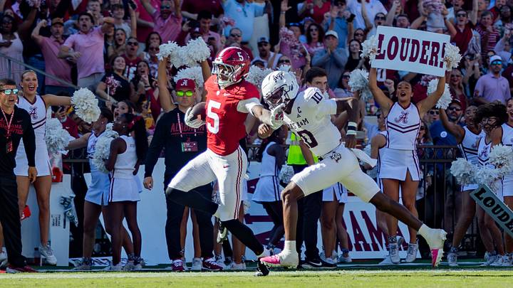 Alabama defensive back Dijon Lee Jr runs back a pick six in the first half of the game against Texas A&M on Oct. 24, 2026. Alabama defensive back Dijon Lee Jr runs back a pick six in the first half of the game against Texas A&M on Oct. 24, 2026.
