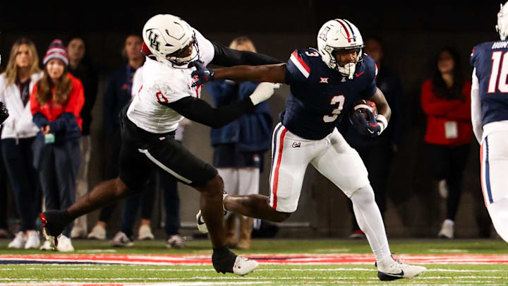 Nov 15, 2024; Tucson, Arizona, USA; Arizona Wildcats running back Kedrick Reescano (3) runs with the ball during the fourth quarter against the Houston Cougars at Arizona Stadium. Mandatory Credit: Aryanna Frank-Imagn Images Nov 15, 2024; Tucson, Arizona, USA; Arizona Wildcats running back Kedrick Reescano (3) runs with the ball during the fourth quarter against the Houston Cougars at Arizona Stadium. Mandatory Credit: Aryanna Frank-Imagn Images