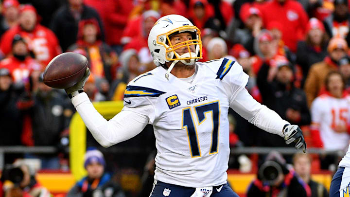 Former Los Angeles Chargers quarterback Philip Rivers (17) throws a pass during the second half against the Kansas City Chiefs at Arrowhead Stadium.