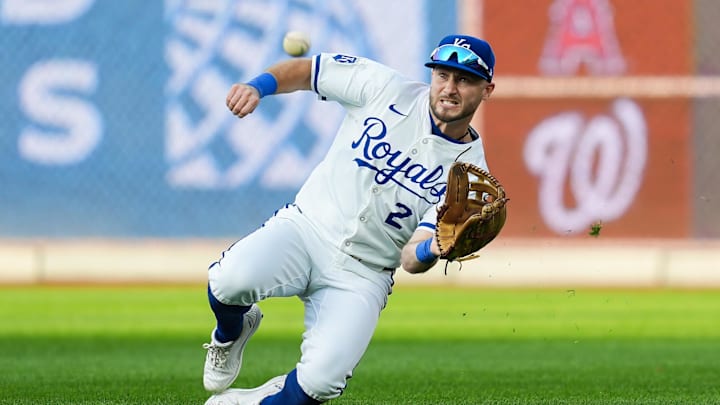 Aug 10, 2024; Kansas City, Missouri, USA; Kansas City Royals right fielder Garrett Hampson (2) makes sliding catch during the fourth inning against the St. Louis Cardinals at Kauffman Stadium. Mandatory Credit: Jay Biggerstaff-Imagn Images