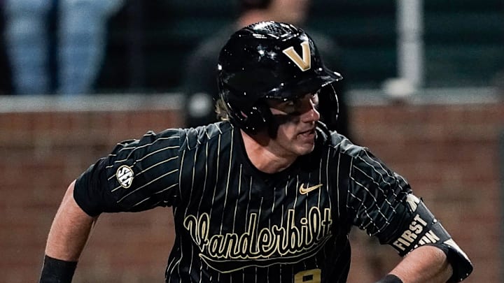 Vanderbilt second baseman Brodie Johnston (9) hits a single against Tennessee during the sixth inning at Hawkins Field in Nashville, Tenn., Friday, March 27, 2026.