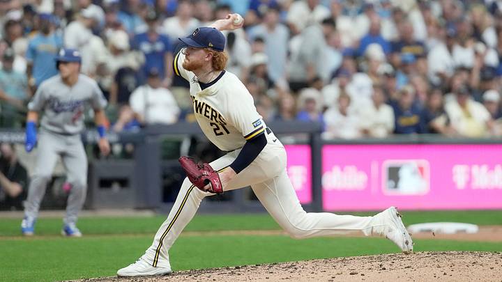 Milwaukee Brewers pitcher Dustin May (21) pitches during the fifth inning of their National League Championship Series game against the Los Angeles Dodgers at American Family Field on Oct 12, 2026. Milwaukee Brewers pitcher Dustin May (21) pitches during the fifth inning of their National League Championship Series game against the Los Angeles Dodgers at American Family Field on Oct 12, 2026.