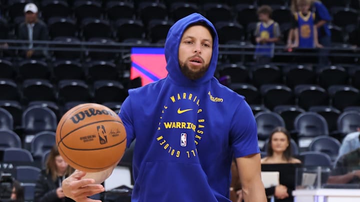 Golden State Warriors guard Stephen Curry (30) warms up before the game against the Utah Jazz at Delta Center. 