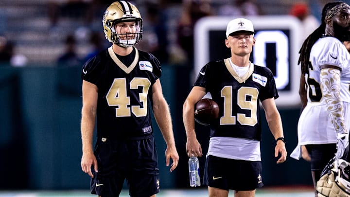 New Orleans Saints punter Matthew Hayball (43) and kicker Blake Grupe (19) look on during practice at Yulman Stadium
